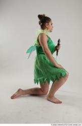 KATERINA KNNELING POSE WITH SWORD